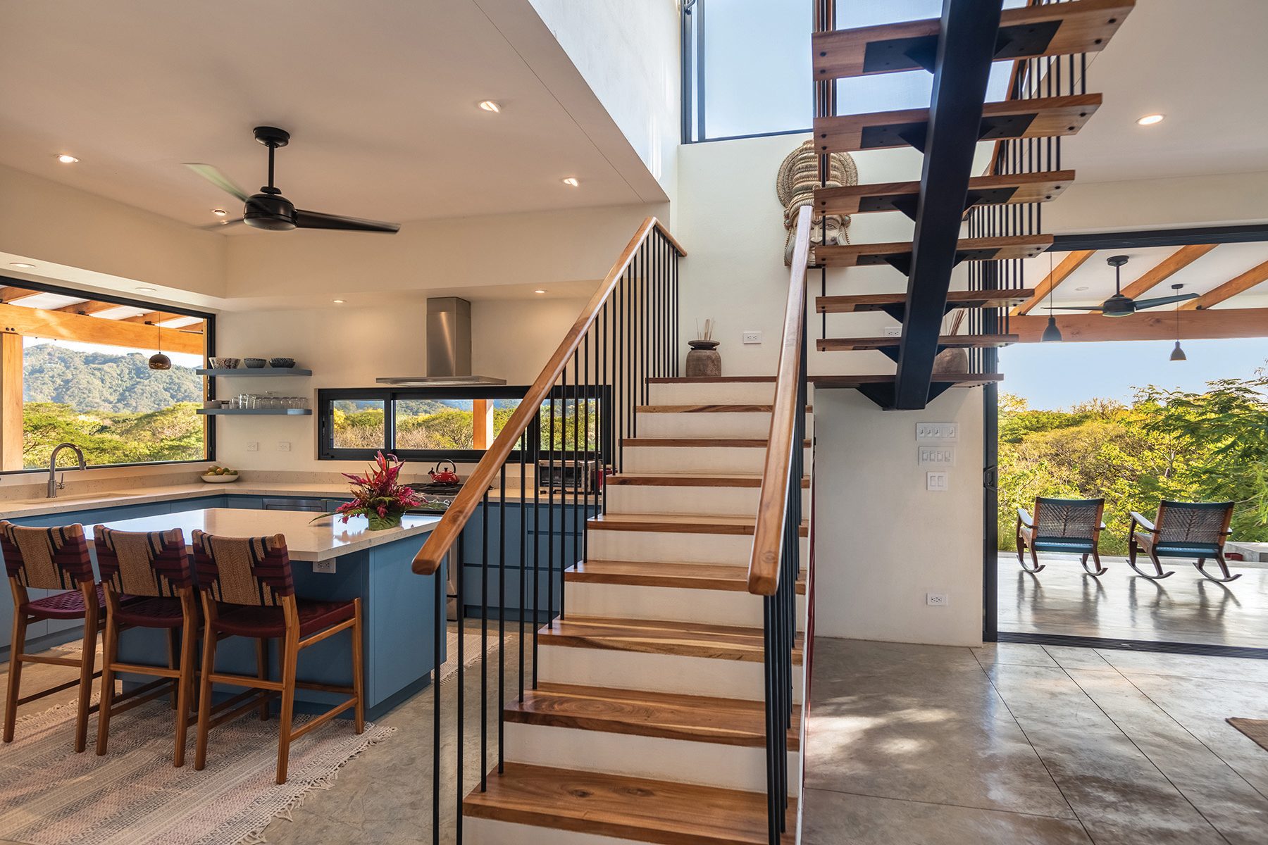 The great room, kitchen and terrace